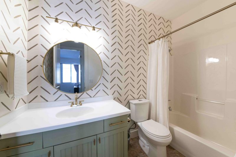 Bathroom with Bold Tile Accent Wall